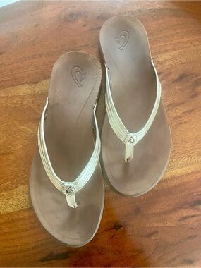 Olukai gold leather Flip Flops